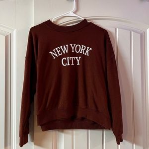 Brown crewneck sweatshirt